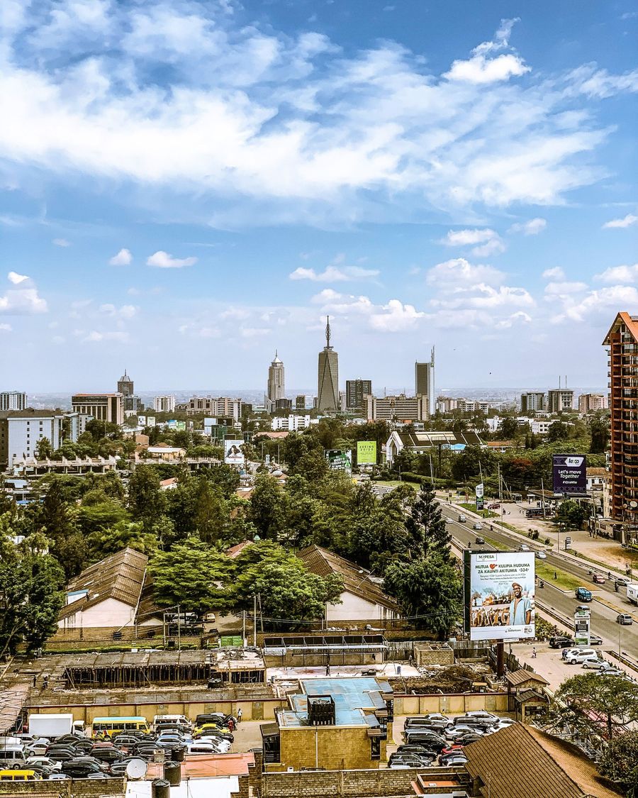 Nairobi skyline seen across tree-lined suburbs